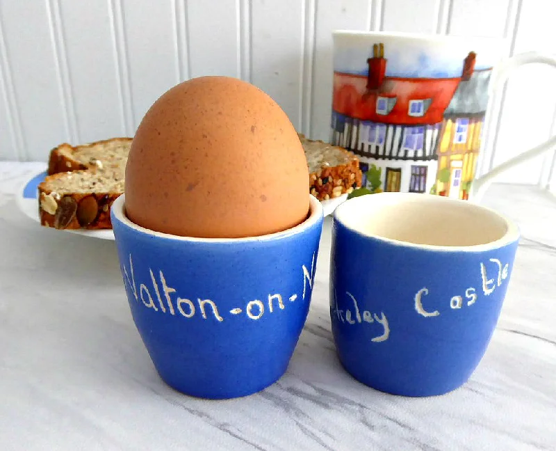 cute ceramic coffee cups for gifts-Devon Ware Egg Cup Pair 1920s Berkeley Castle Walton-On-Naze Eggcups Bue White